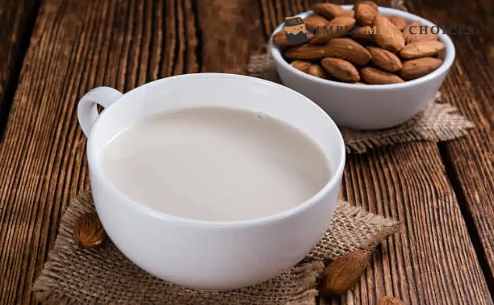 Heated Almond Milk with bowl of almonds