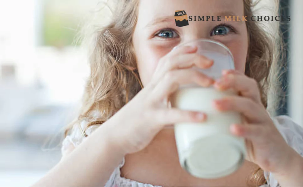 a girl drinking milk
