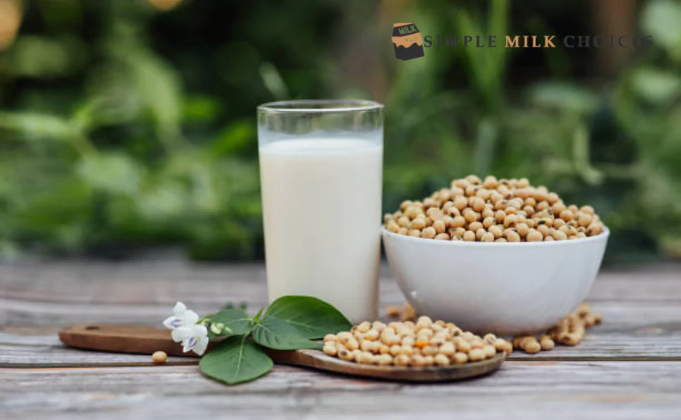 A visually appealing arrangement featuring a glass of milk, a spoonful of soy, and a bowl, highlighting the goodness of soy milk and its numerous health benefits.