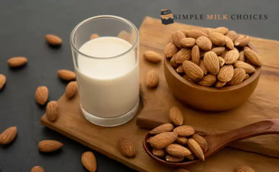 Glass of almond milk surrounded by bulk almond spread, showcasing gluten-free options for dietary needs.