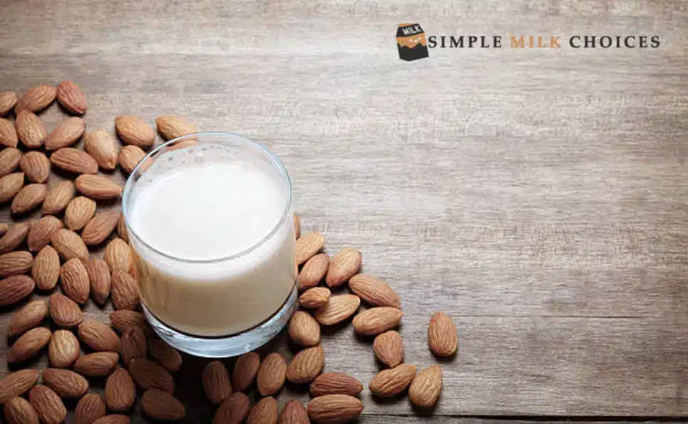 A glass of almond milk with text overlay reading 'Is Almond Milk High in Histamine? Some individuals with histamine sensitivity find almond milk to be a tolerated option.